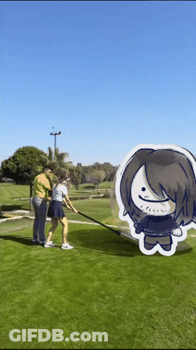 Man In Yellow Shirt With Woman On Golf Course GIF