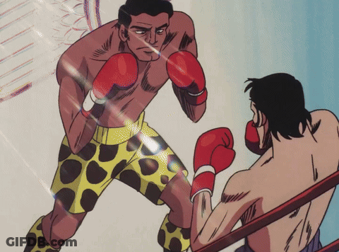 Man In Yellow Shorts Boxing Man In Red Gloves GIF