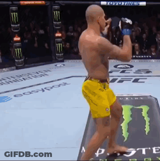 Man In Yellow Shorts Standing In Front Of Monster Energy Can GIF