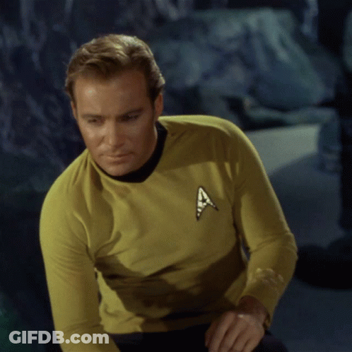 Man In Yellow Star Trek Logo Shirt GIF