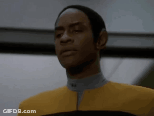 Man In Yellow Suit And Black Hat GIF