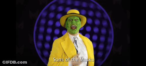 Man In Yellow Suit And Green Mask GIF