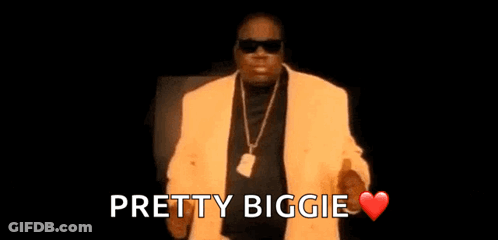 Man In Yellow Suit And Sunglasses Thumbs Up Saying Pretty Biggie GIF