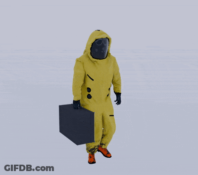 Man In Yellow Suit Carrying Black Box GIF