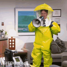 Man In Yellow Suit Holding Megaphone GIF