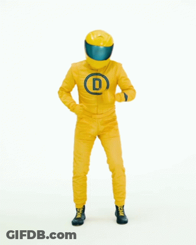 Man In Yellow Suit In Front Of Hurry Up Sign GIF