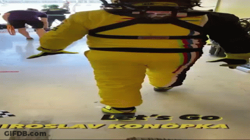 Man In Yellow Suit Walking Saying Let's Go GIF