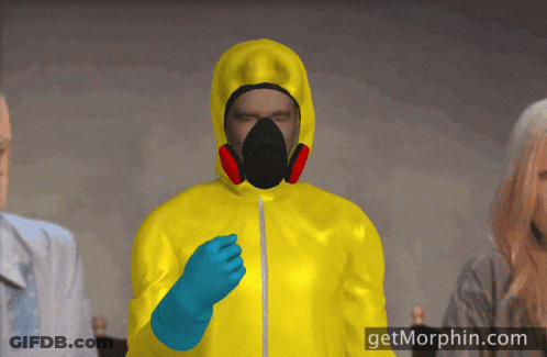 Man In Yellow Suit With Gas Mask And Blue Gloves At Getmorphin.com GIF