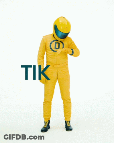 Man In Yellow Suit With Helmet Saying Tok GIF