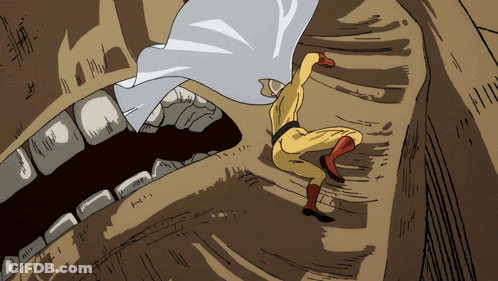 Man In Yellow Superhero Costume Attacked By Monster GIF