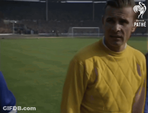 Man In Yellow Sweater GIF