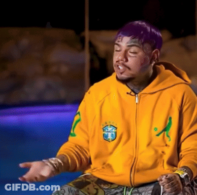 Man In Yellow Sweatshirt With Letter T GIF