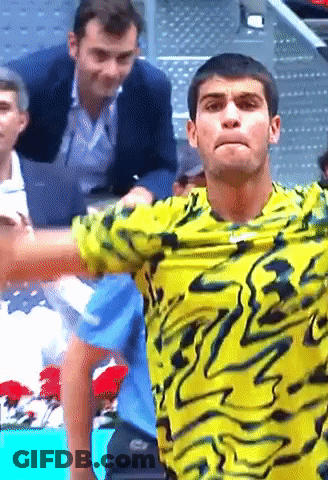 Man In Yellow Swirl Shirt GIF