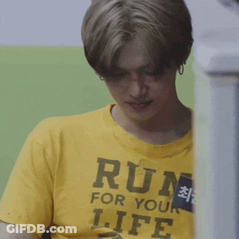 Man In Yellow T-Shirt Saying Run For Your Life GIF