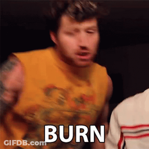 Man In Yellow Tank Top Says Burn GIF