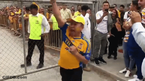 Man In Yellow Tigres Shirt Dancing GIF