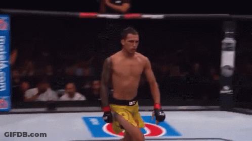 Man In Yellow UFC Shorts Walking Out GIF