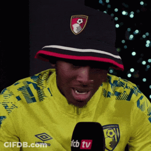 Man In Yellow Umbro Jacket Talking GIF