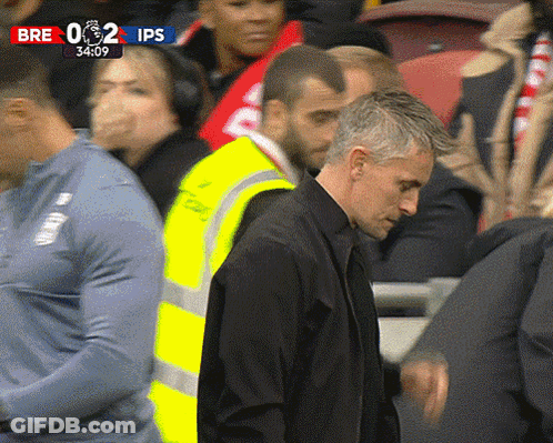 Man In Yellow Vest Before Crowd Score 0-2 GIF