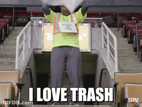Man In Yellow Vest Holding Sign My Picks Are Trash GIF