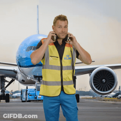 Man In Yellow Vest KLM GIF