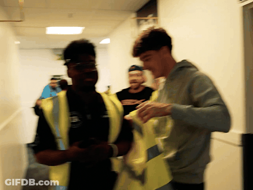 Man In Yellow Vest With A GIF