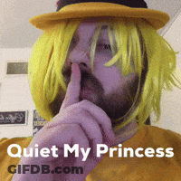 Man In Yellow Wig And Hat Shushing Quiet My Princess GIF