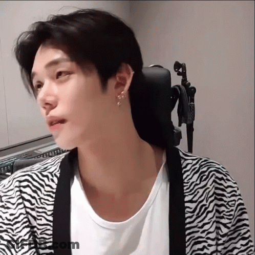 Man In Zebra Print Cardigan And White Shirt GIF