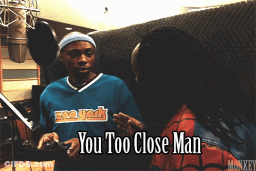 Man In Zoo York Shirt Talking To Another Man GIF