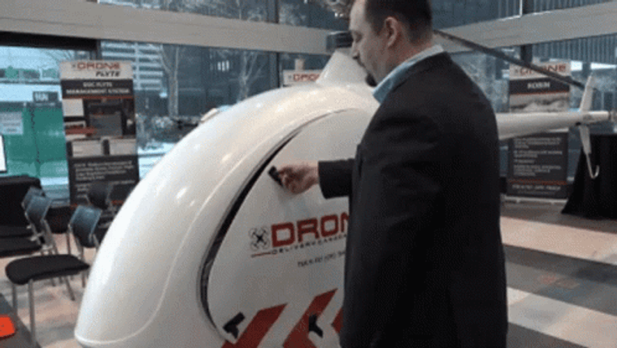 Man Inside Amazon Drone Delivery GIF