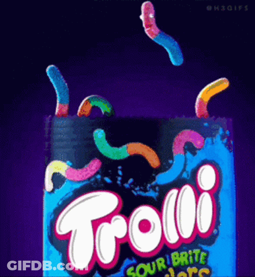 Man Inside Packet Of Worm Gummies GIF