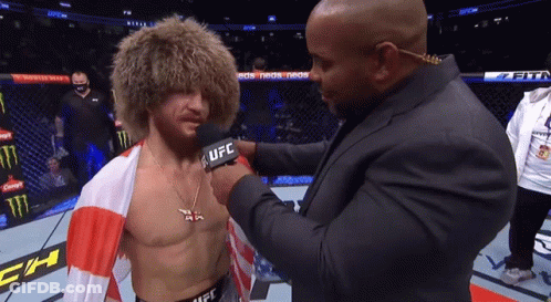 Man Interviewed By Man With UFC Microphone GIF