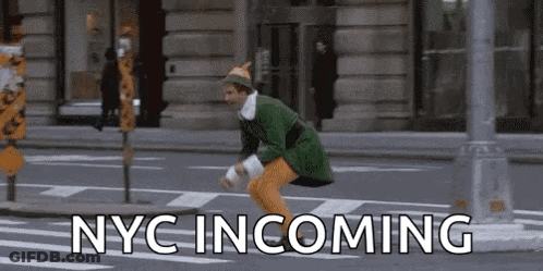 Man Jumping Crosswalk In Green Elf Costume GIF