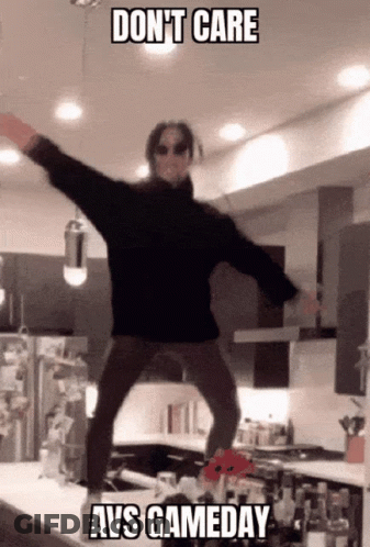 Man Jumping In Black Sweater Don T Care Gameday GIF