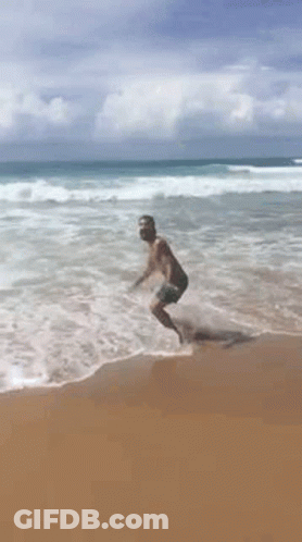 Man Jumping In Ocean GIF