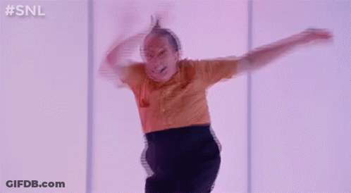 Man Jumping In Yellow Shirt And Black Skirt GIF