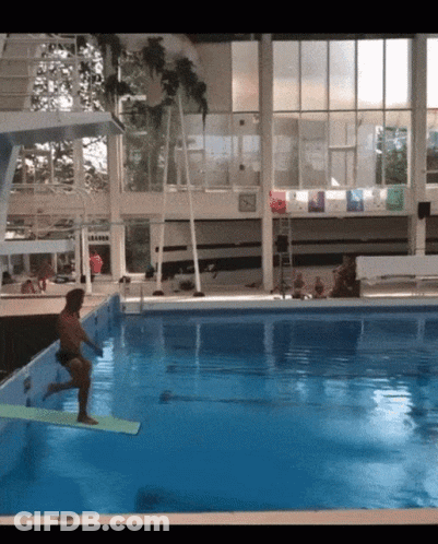 Man Jumping Into Pool With L Eau Sign GIF
