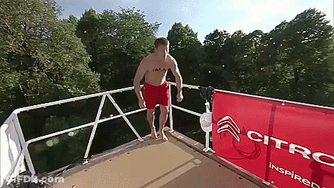 Man Jumping Into Water With Citroen Sign GIF