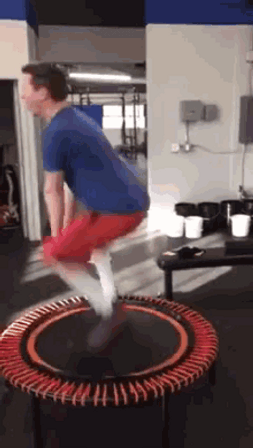 Man Jumping On A Trampoline GIF