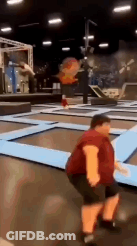 Man Jumping On Trampoline GIF