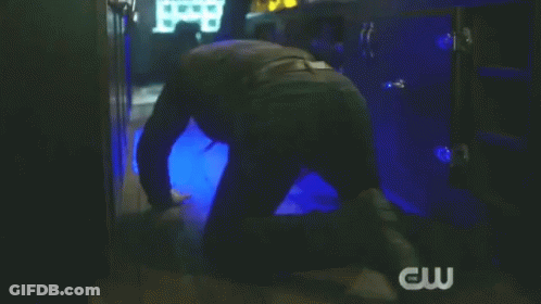 Man Jumping Over Bar With CW Logo GIF