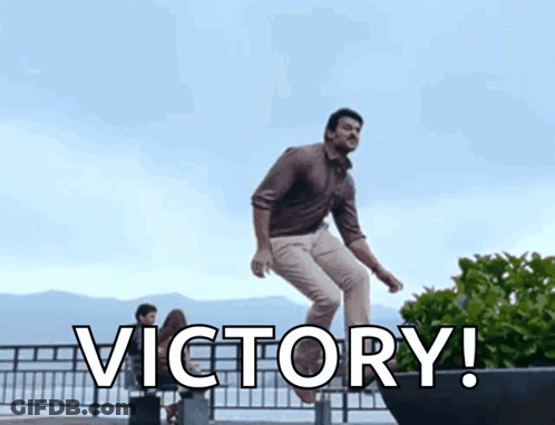 Man Jumping Over Fence With Victory GIF