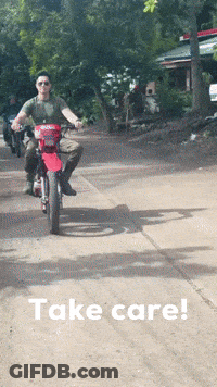 Man Jumping Over Rock Holding Rope GIF
