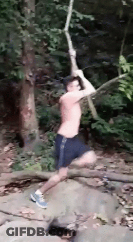 Man Jumping Over Rock With Rope GIF