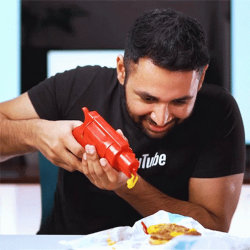 Man Ketchup Gun GIF