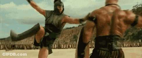 Man Kicking Another Man In Stomach GIF
