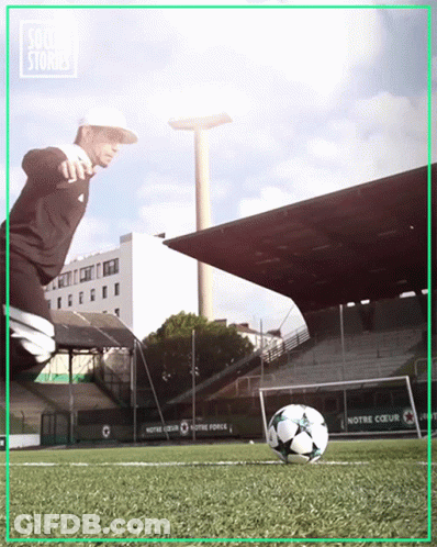 Man Kicking Soccer Ball At Notre Coeur Stadium GIF