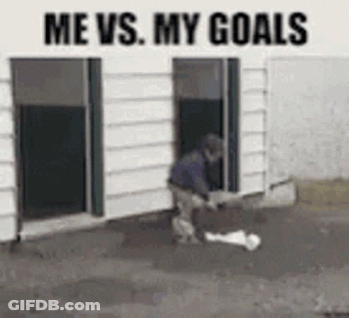 Man Kicking Soccer Ball In Front Of Building Saying Me Vs. My Goals GIF