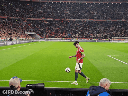 Man Kicking Soccer Ball On Field With Hungary GIF