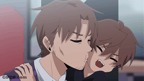 Man Kissing Another Man On Cheek GIF